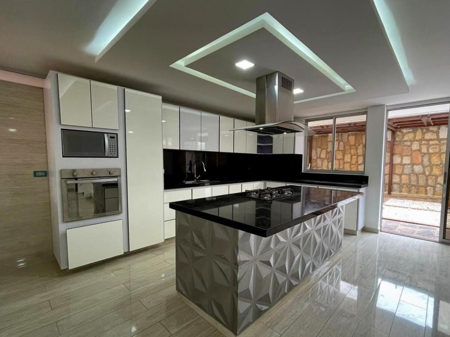 Cocina de Gran Envergadura con Isla Central en Fusagasugá - EL PRIMO Carpintería
